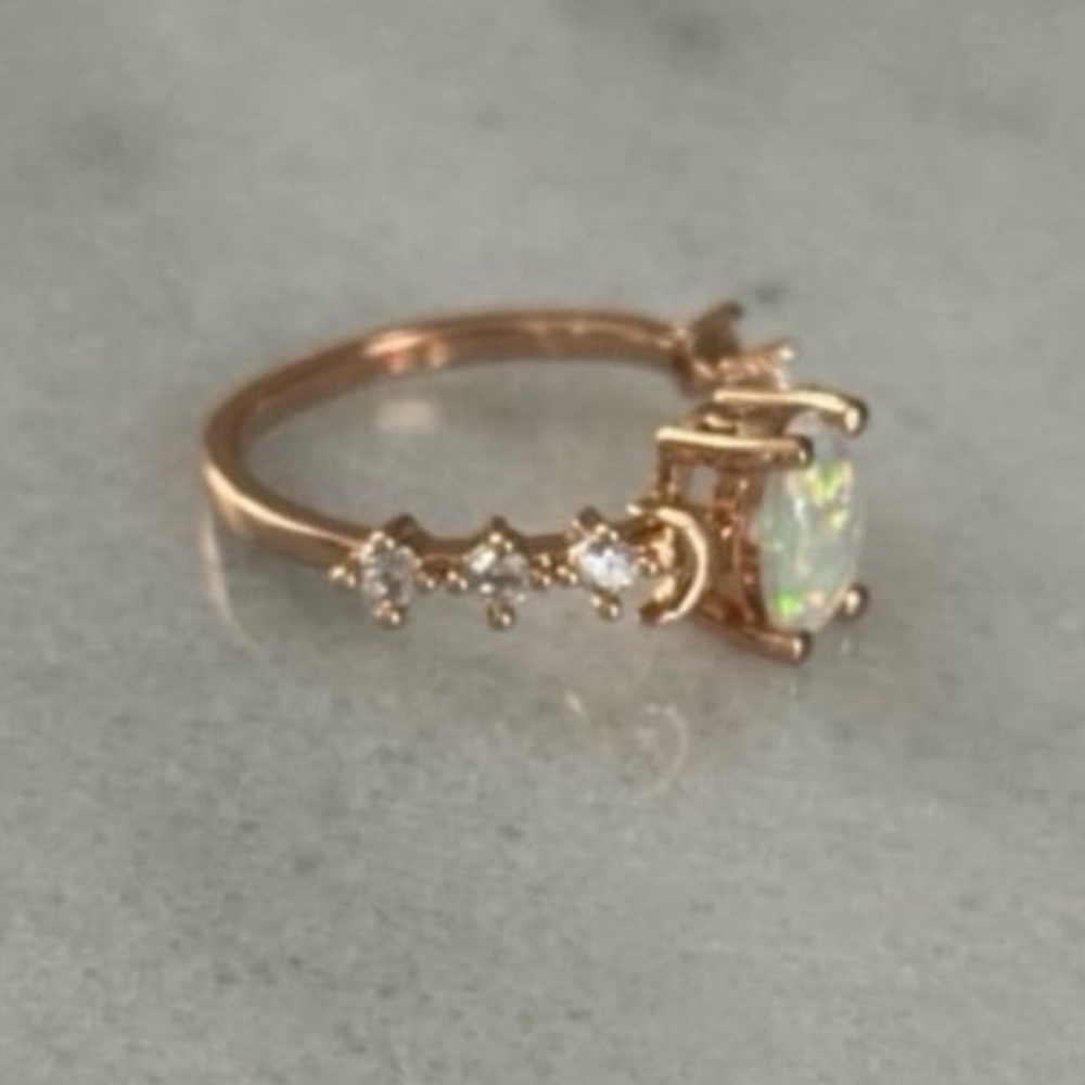 Rose Gold Opal Moon Crystal Ring Size 7 Brand New

Brand New - Picture 2 of 6